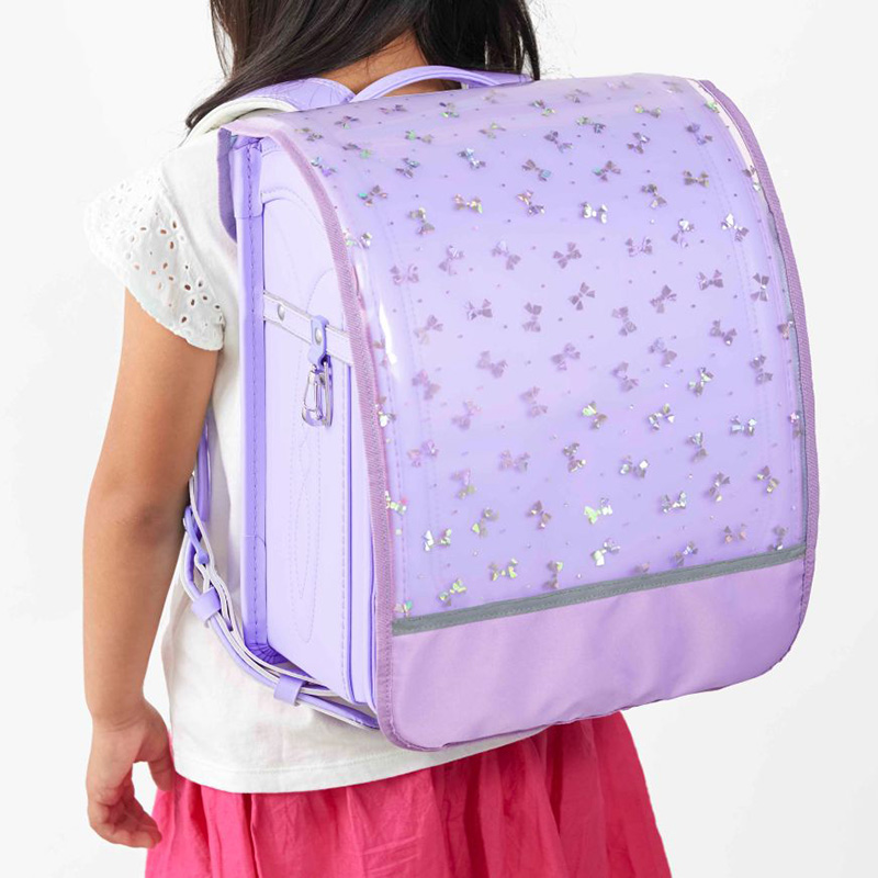 ランドセルカバー キラキラ 収納ポケット付き 透明 バイオレット リボン柄